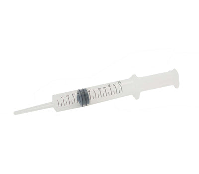 Irrigation Syringe 12cc with clear plastic barrel, measurement markings, and extended tip nozzle for precise wound cleaning and debris removal in wilderness first aid applications