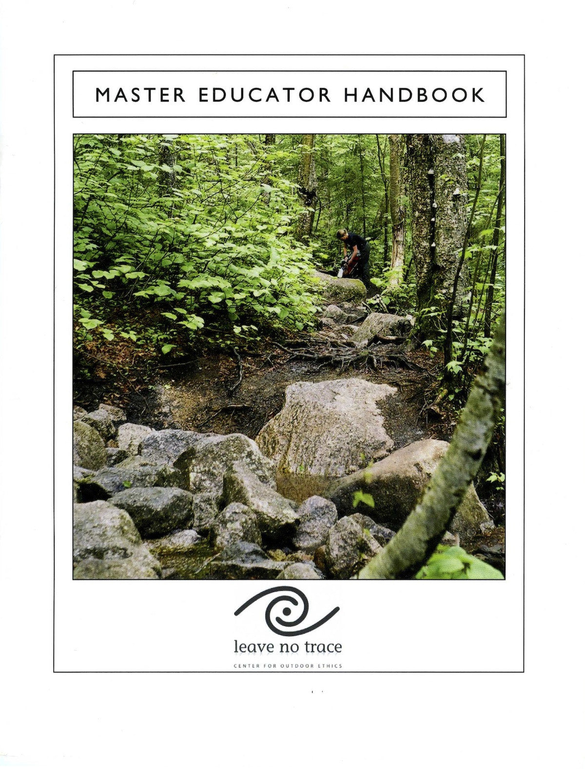 LNT Master Educator Handbook cover featuring a scenic forest trail with rocky terrain, lush green foliage, and mossy trees surrounding a natural stone pathway. The Leave No Trace logo appears at the bottom of the white-bordered image.